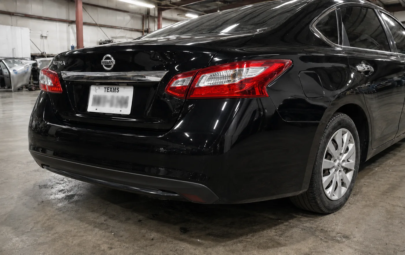 Nissan Altima with restored body and paint, after repair
