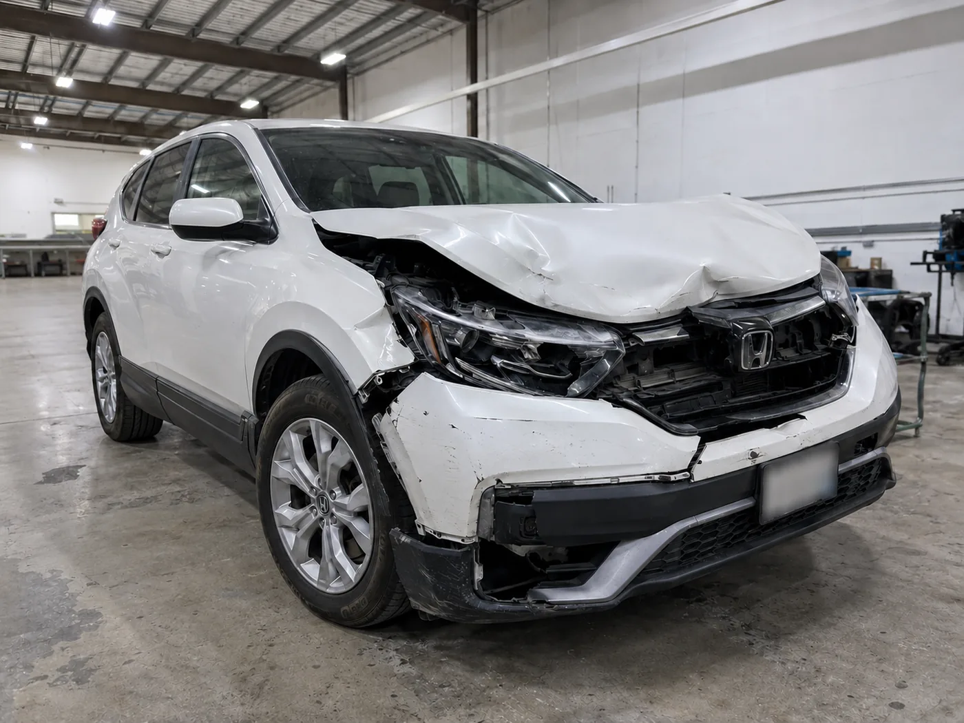 Honda CR-V with severe front-end impact, before repair